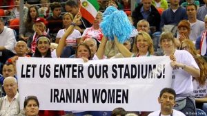 women entering stadium