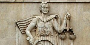 justice statue iran 440x220