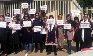 women entering stadium 02