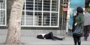 homme au sol coronavirus iran